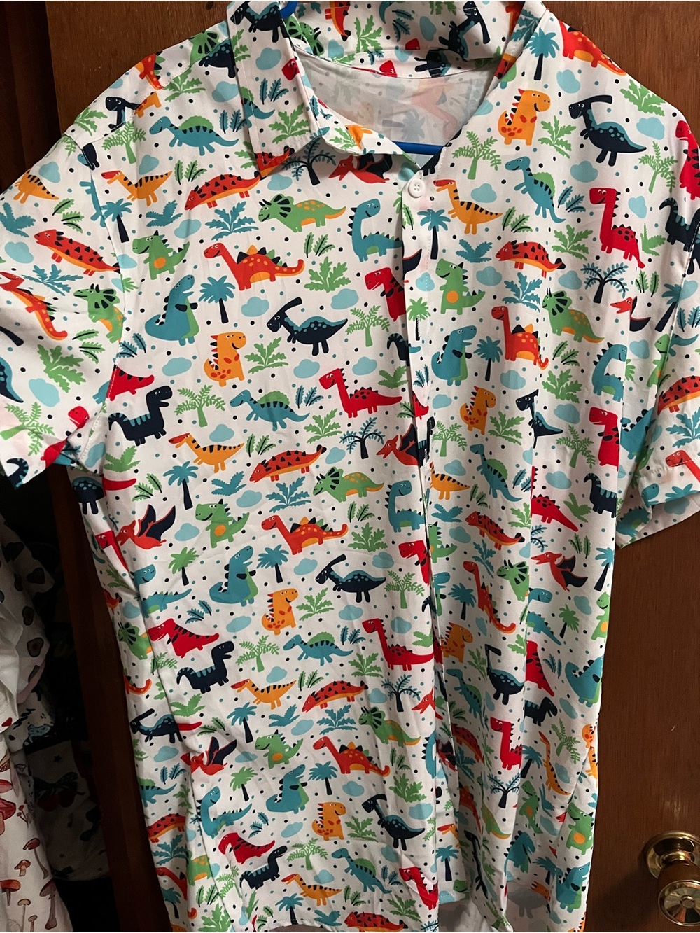 White Short-Sleeve Button Polo with Colorful Dinosaur Print